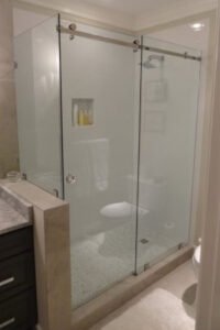 FRAMELESS ENCLOSURE - BARN DOOR FRAMELESS ENCLOSURE - BARN DOOR
